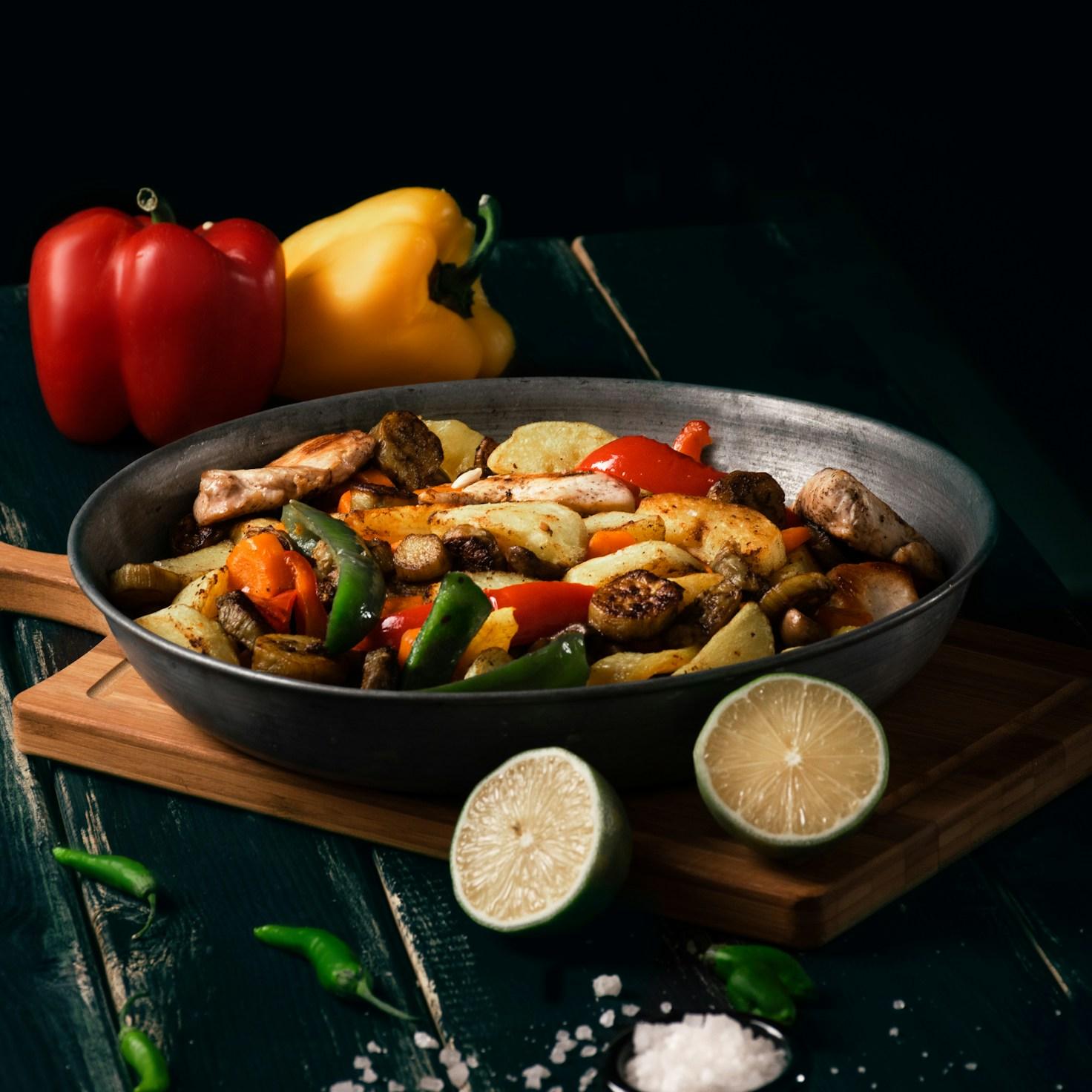 Community members working together in a contemporary kitchen, exchanging recipes and techniques